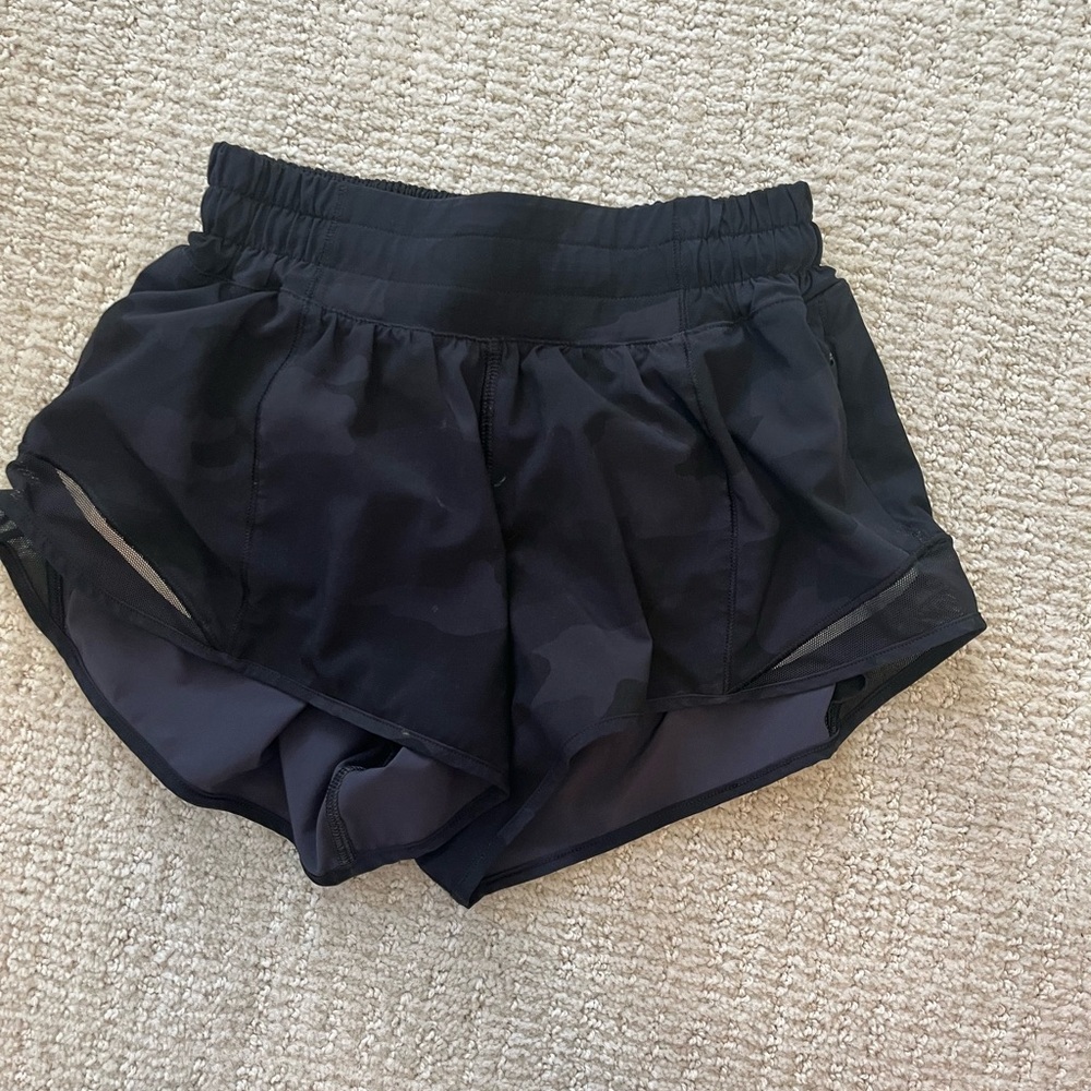 Lululemon size 0 black camo hotty hot shorts. Used but in great condition.